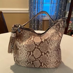 Michael Kors snake skin bag.